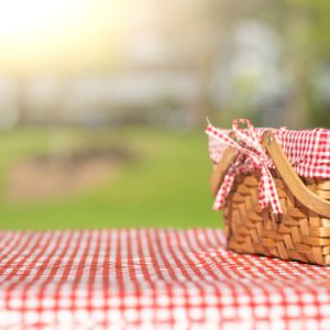 Photo of picnic basket on a picnic table