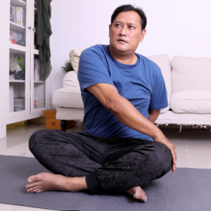 Man used mobility exercises before meditation