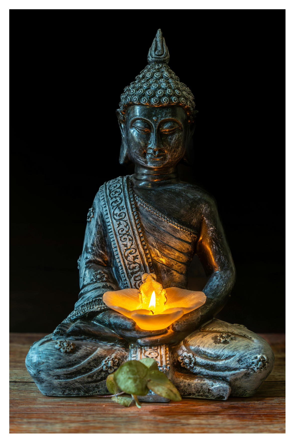 Buddha with candle